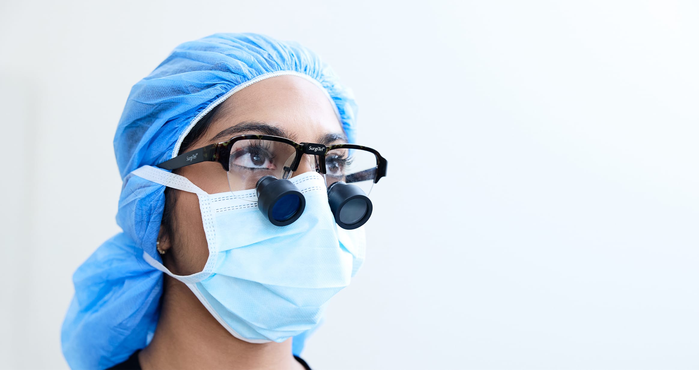 Doctor wearing eye equipment